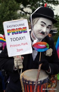 Charlie Chaplin at Pride- holding an Eastbourne Pride sign
